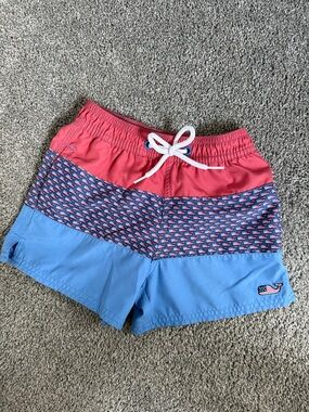 Vineyard Vines Boys Swim Trunks in Coral, Navy & Light Blue patriotic whales.